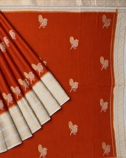 Raw silk sarees with Gold and Silver Zari Peacock design and Contrast border - orange