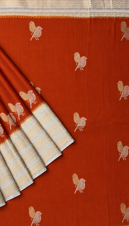 Raw silk sarees with Gold and Silver Zari Peacock design and Contrast border - orange