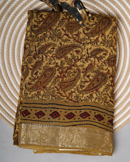 Chiffon sarees with Kalamkari print and zari-woven borders - Mustered Yellow