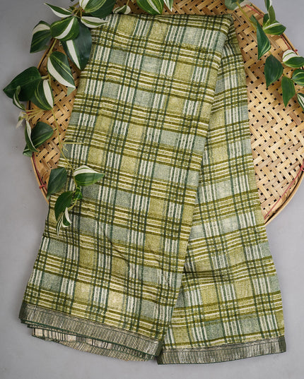 Muslin Silk Saree With Silver Zari Border - Green
