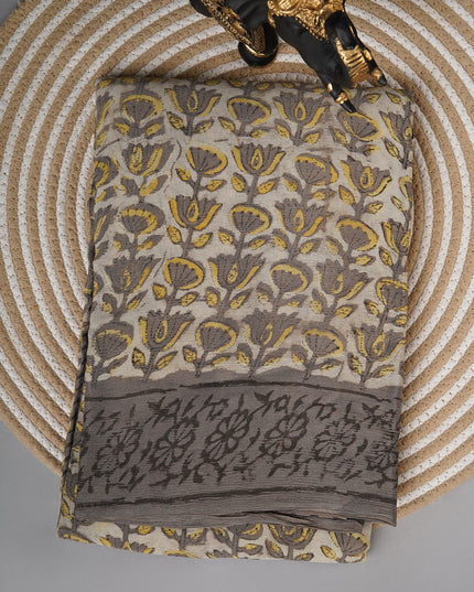 Chiffon sarees with Kalamkari print and zari-woven borders - Cream