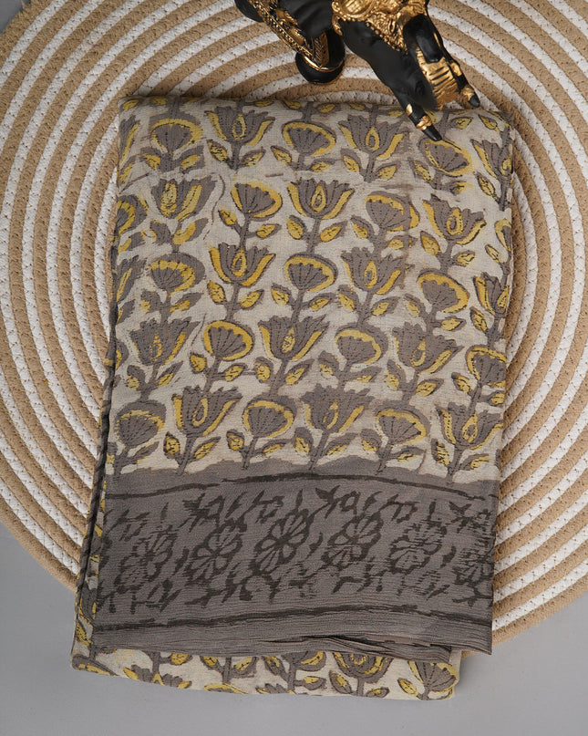 Chiffon sarees with Kalamkari print and zari-woven borders - Cream