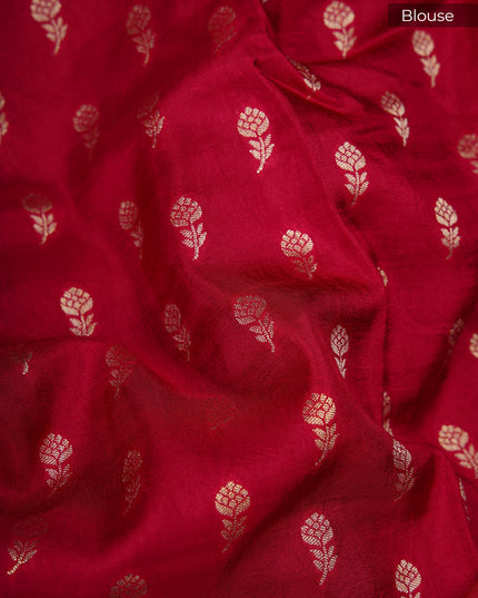 Green silk saree with all over golden zari  check weaving and contrast elephant borde - Navy