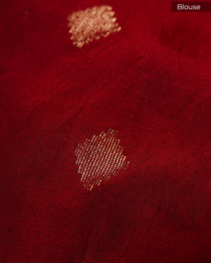 Banarasi Saree featuring Half white body with colorful Sequin like floral designs & a broad intricately woven red & Gold Zari border - Half White