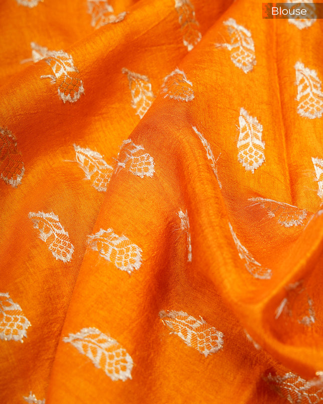 Green silk saree with all over golden zari  check weaving and contrast elephant border - Bottle Green