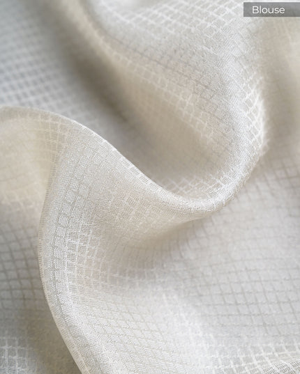 Banarasi Silk Saree with Meenakari Butties and Gold Border- Half White