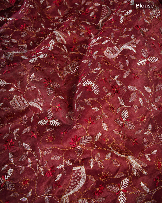 Linen saree with thread work motifs and scallop border - Maroon