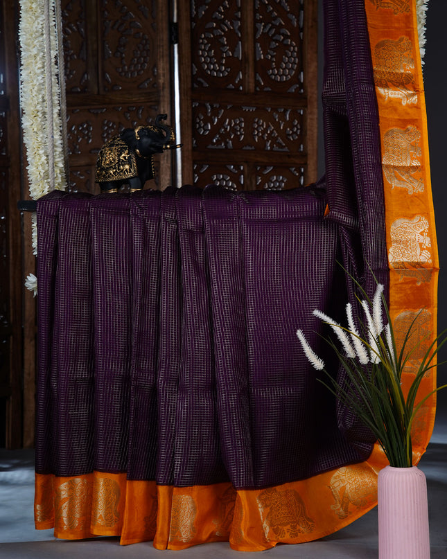 Green silk saree with all over golden zari  check weaving and contrast elephant border-Violet