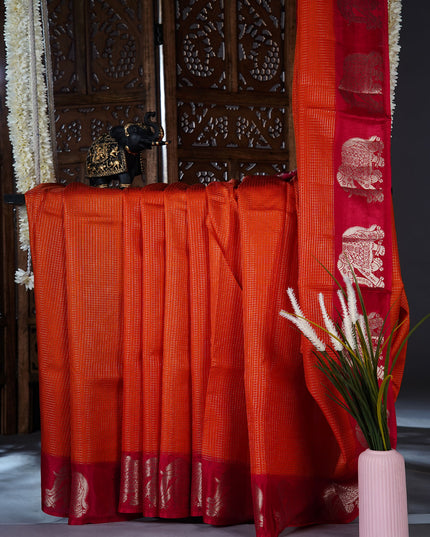 Green silk saree with all over golden zari  check weaving and contrast elephant border - Orange
