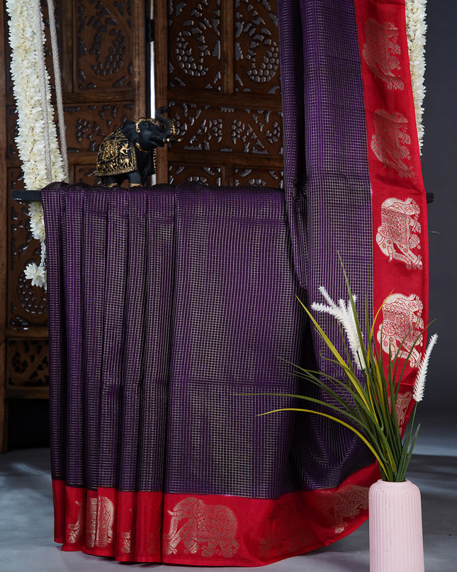 Green  silk saree with all over golden zari  check weaving and contrast elephant border - Violet& Red