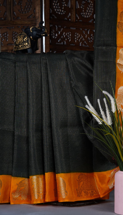 Green silk saree with all over golden zari  check weaving and contrast elephant border - Bottle Green