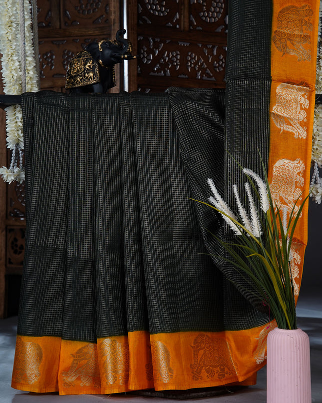 Green silk saree with all over golden zari  check weaving and contrast elephant border - Bottle Green