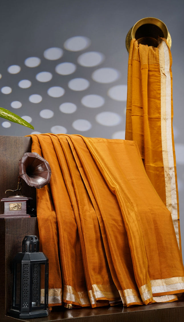 Binny Crepe Silk Saree With Golden Silver Zari Border - MUSTERED