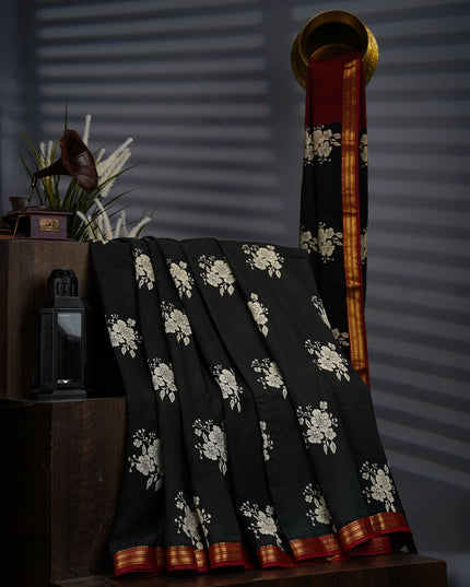 Muslin Silk Saree With Floral Butties And Contrast Border - Black