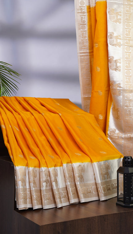 Dola Silk Saree with White Border Golden Zari Butties