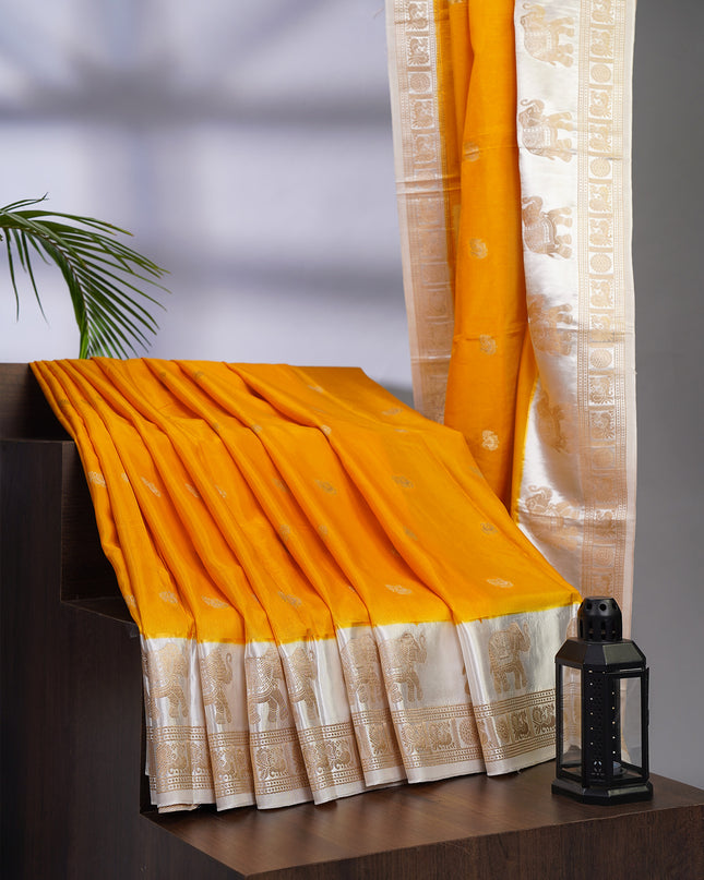 Dola Silk Saree with White Border Golden Zari Butties