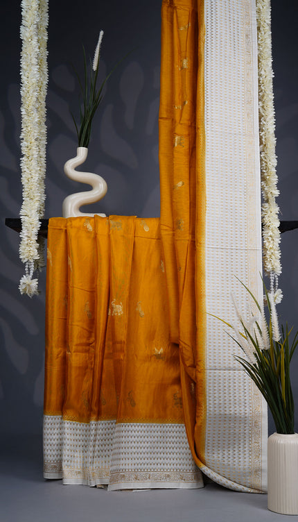 Dola Silk Saree with Golden Butties and Contrast Border- Yellow