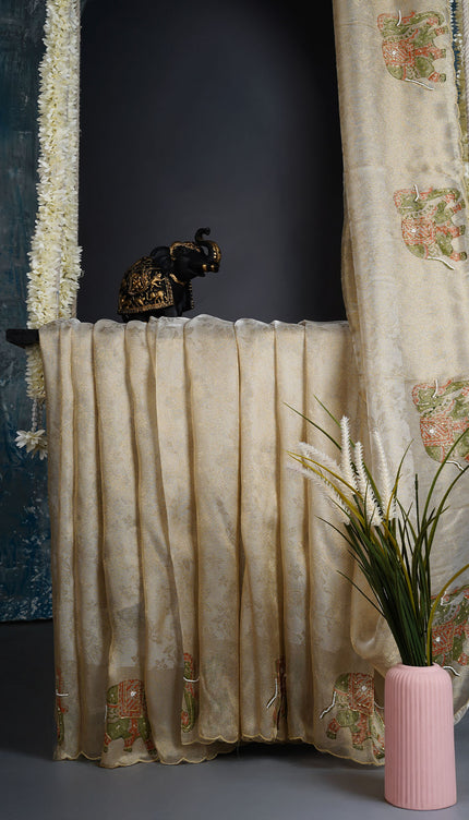 Tissue Georgette saree with print butties and scallop border - Tan