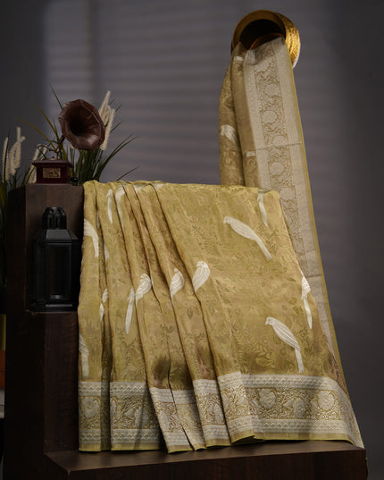 Tissue Banarasi Silk with All Over Self Weaving with Light Gold Zari Border - Green