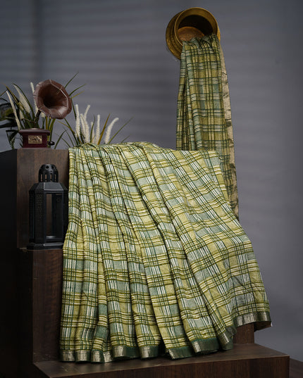 Muslin Silk Saree With Silver Zari Border - Green