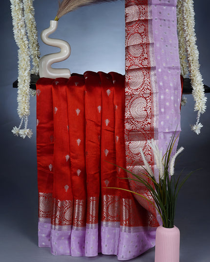 Chiniya Silk Saree with a contrasting lavender Border featuring intricate Gold & Silver Zari work - Red