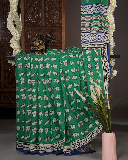 Mul cotton saree with Elephant print butties and contrast border - Bottle Green