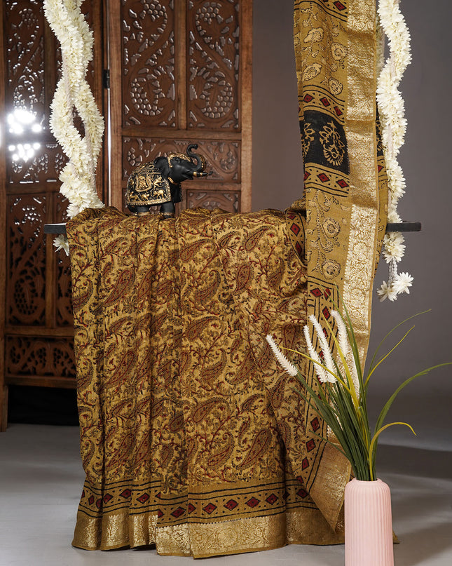 Chiffon sarees with Kalamkari print and zari-woven borders - Mustered Yellow