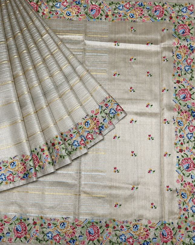 Soft  Tissue Orznga  Saree With Allover Gold and Silver Zari Lines Design with  petite point work Border - Cream