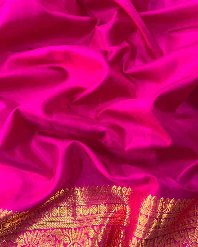 Pure Kanchi Pattu Saree With Allover Peacock Motifs and Golden Border - Rani Pink