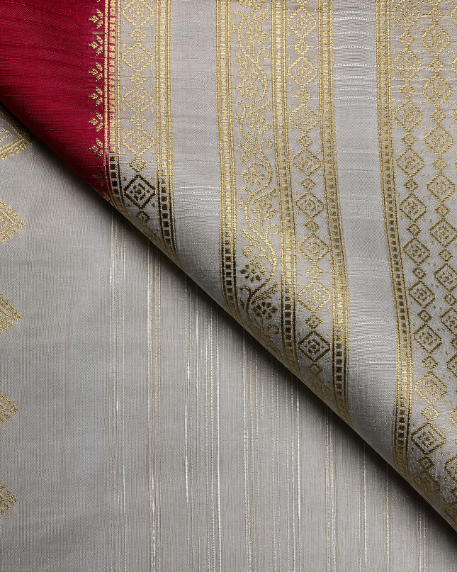 Raw silk sarees with Gold and Silver Zari Peacock design and Contrast border - orange