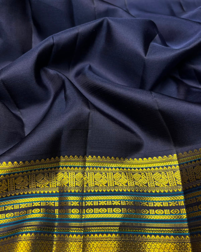 Pure Kanchi Pattu Saree With Allover Small Golden Butties and Contrast Border - Off White