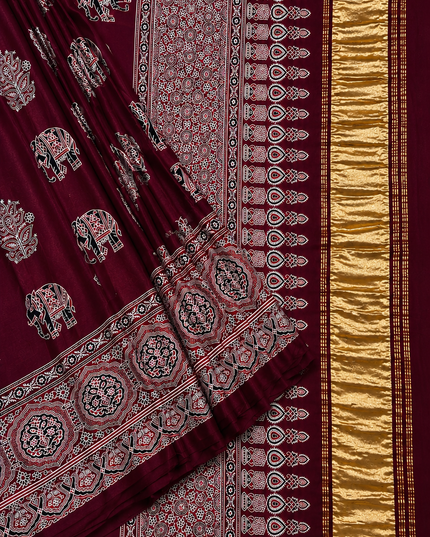 Modal silk saree with  ajrakh Design and Small Border  - Maroon