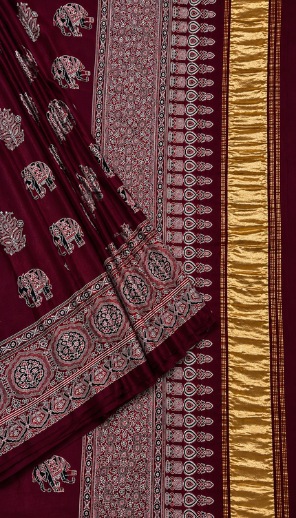 Modal silk saree with  ajrakh Design and Small Border  - Maroon