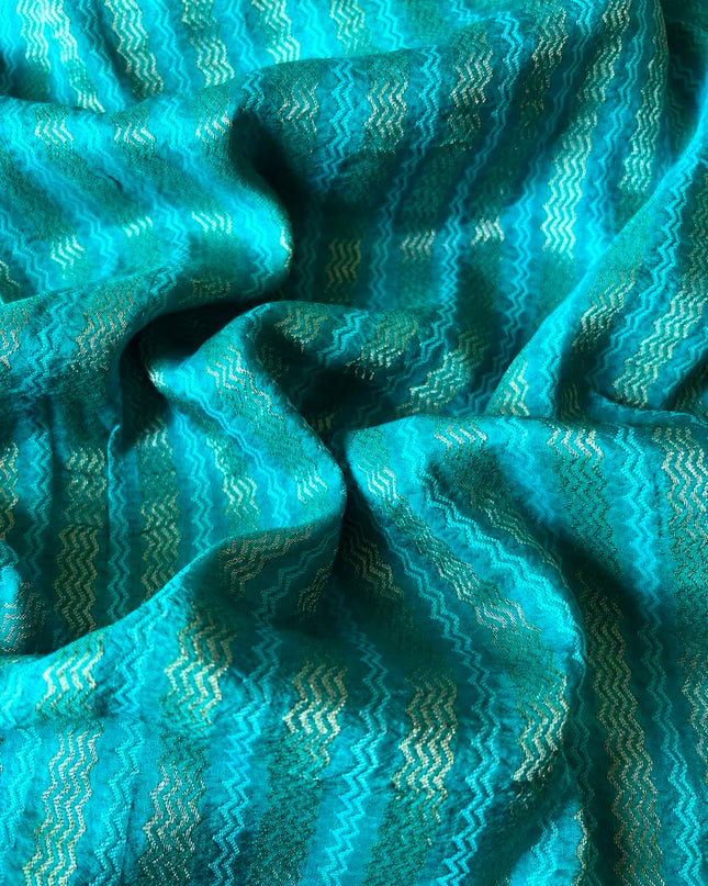 Dola silk sarees with  Gold Butties and zari Border-  Sky Blue