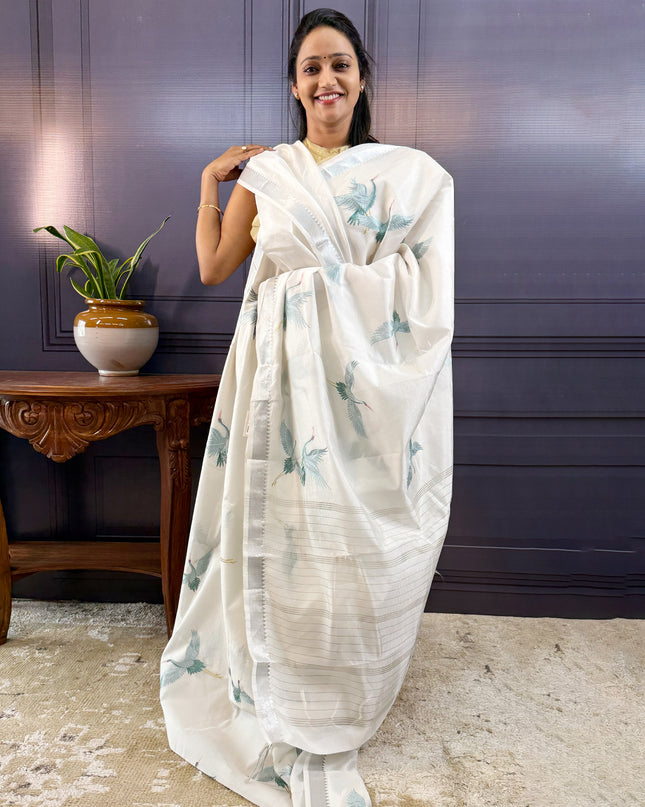 Mangalagiri silk saree with thired embroidery buties with silver border- white