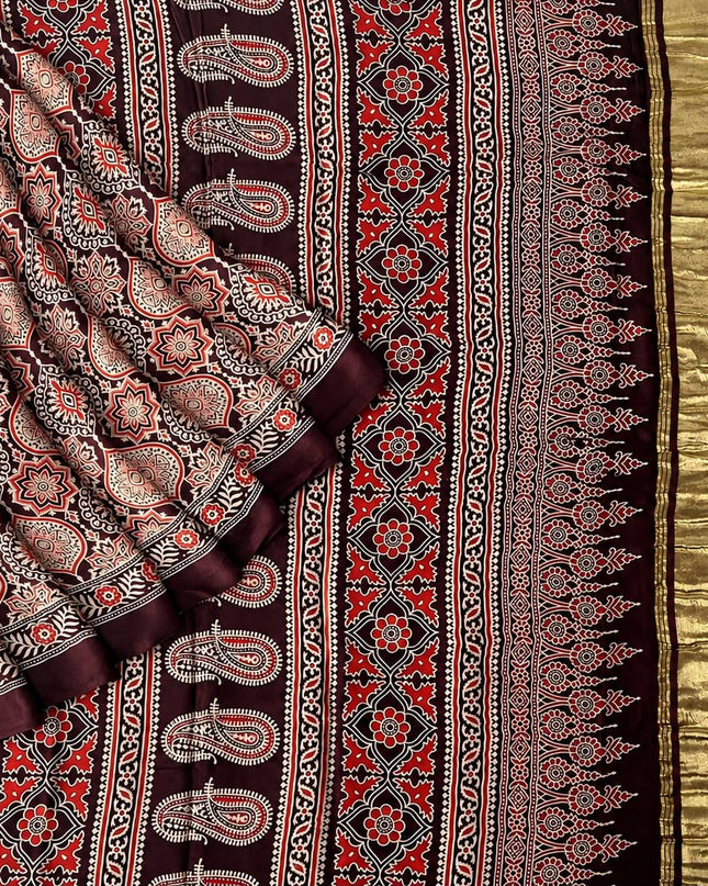 Modal silk saree with ajrakh Design and  Contrast Border - Maroon