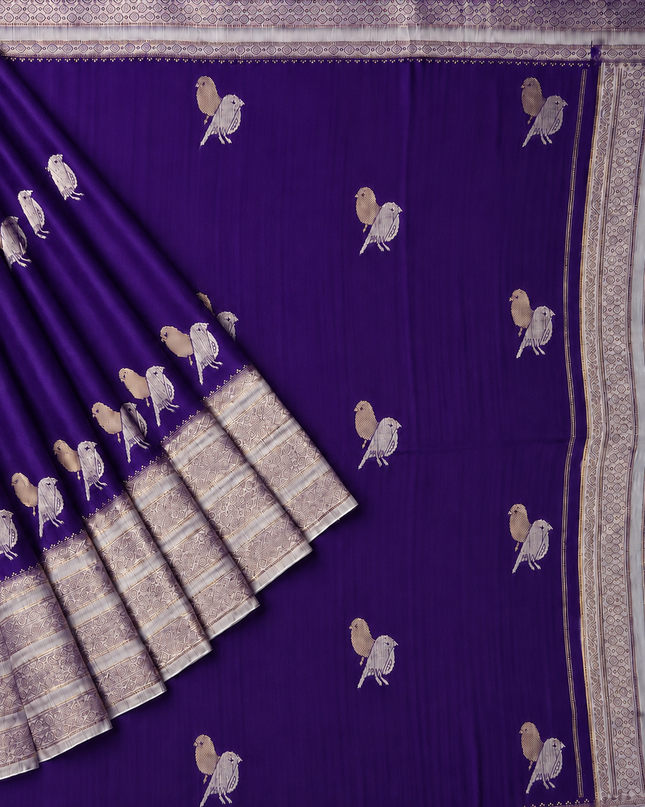 Raw silk sarees with Gold and Silver Zari Peacock design and Contrast border - Violet