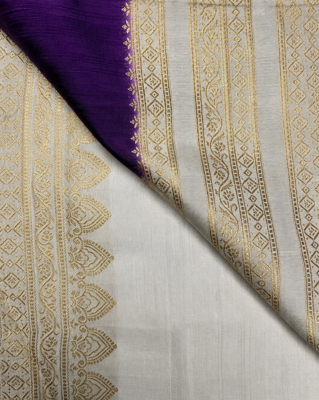 Raw silk sarees with Gold and Silver Zari Peacock design and Contrast border - Violet