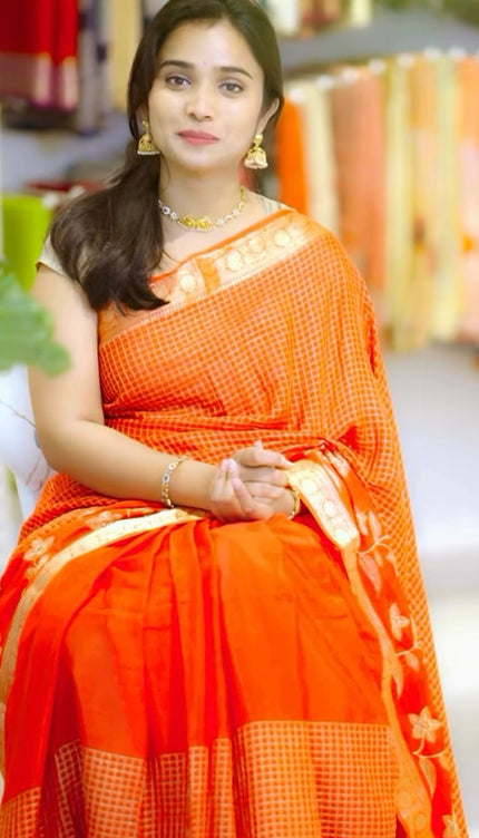 Koren Crepe Saree With All Over Checks Design and Flower Design Border - Orange