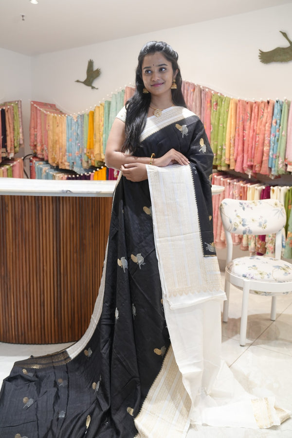 Raw silk sarees with Gold and Silver Zari Peacock design and Contrast border - Black