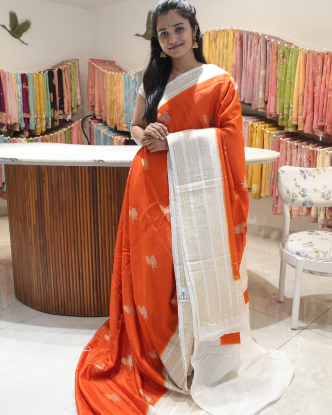 Raw silk sarees with Gold and Silver Zari Peacock design and Contrast border - orange