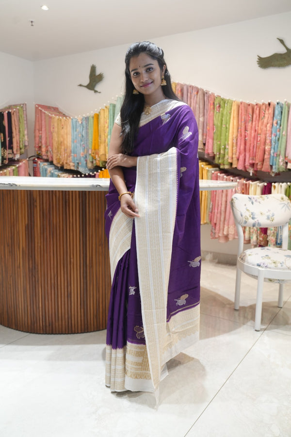Raw silk sarees with Gold and Silver Zari Peacock design and Contrast border - Violet