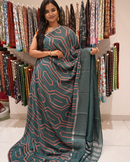 Dola silk sarees with Geometrical Design and Zari Stripes Border- Rama Green