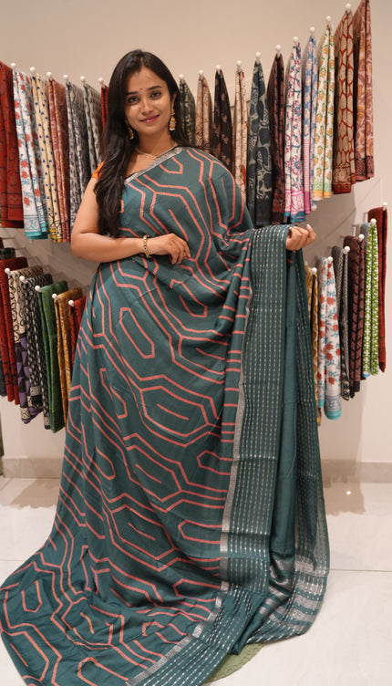 Dola silk sarees with Geometrical Design and Zari Stripes Border- Rama Green