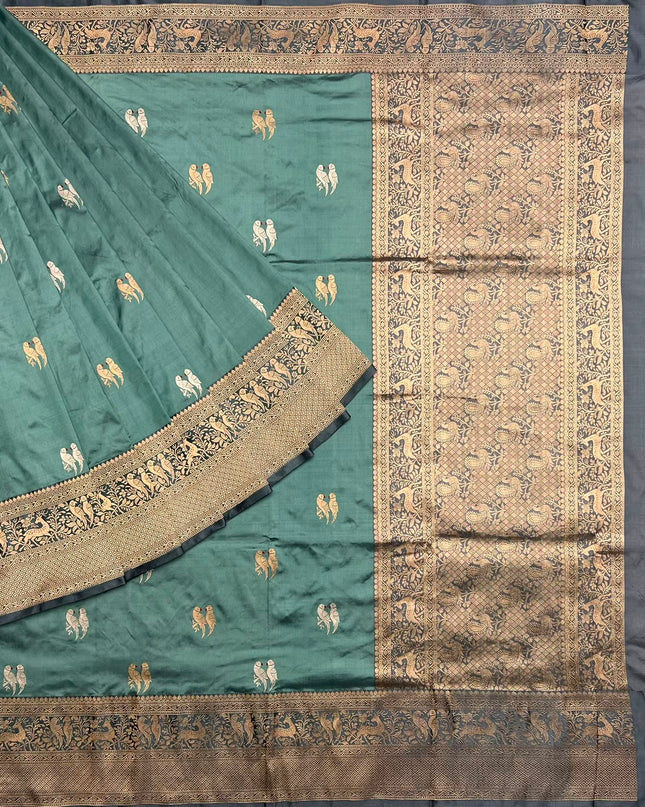 Kathan Silk Saree With All over Gold & Silver Zari Dual Parrot  Buttes and Golden Zari Weaving Cow Border - Light Blue