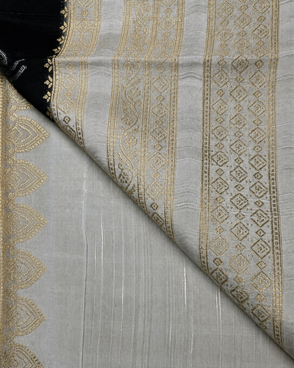 Raw silk sarees with Gold and Silver Zari Peacock design and Contrast border - Black
