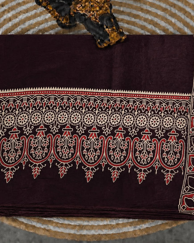 Modal silk saree with ajrakh Design and  Contrast Border -  Maroon