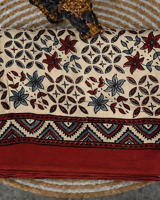 Modal silk saree with ajrakh Design and  Contrast Border - Cream & Red