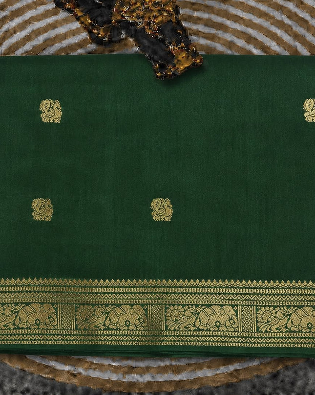 Dola silk sarees with  Gold Butties and zari Border- Bottle Green