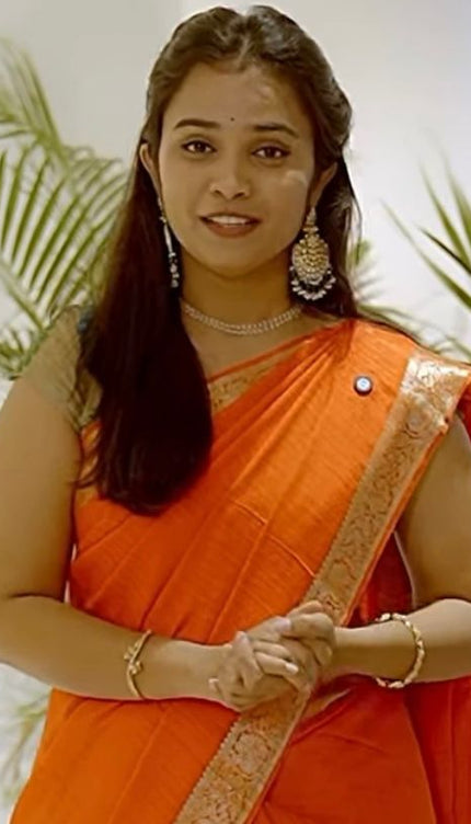 Koren Crepe Saree With All Over Checks Design and Flower Design Border - Orange